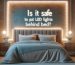 Is it safe to put LED lights behind bed